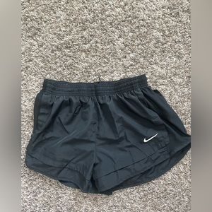 Black Nike running shorts